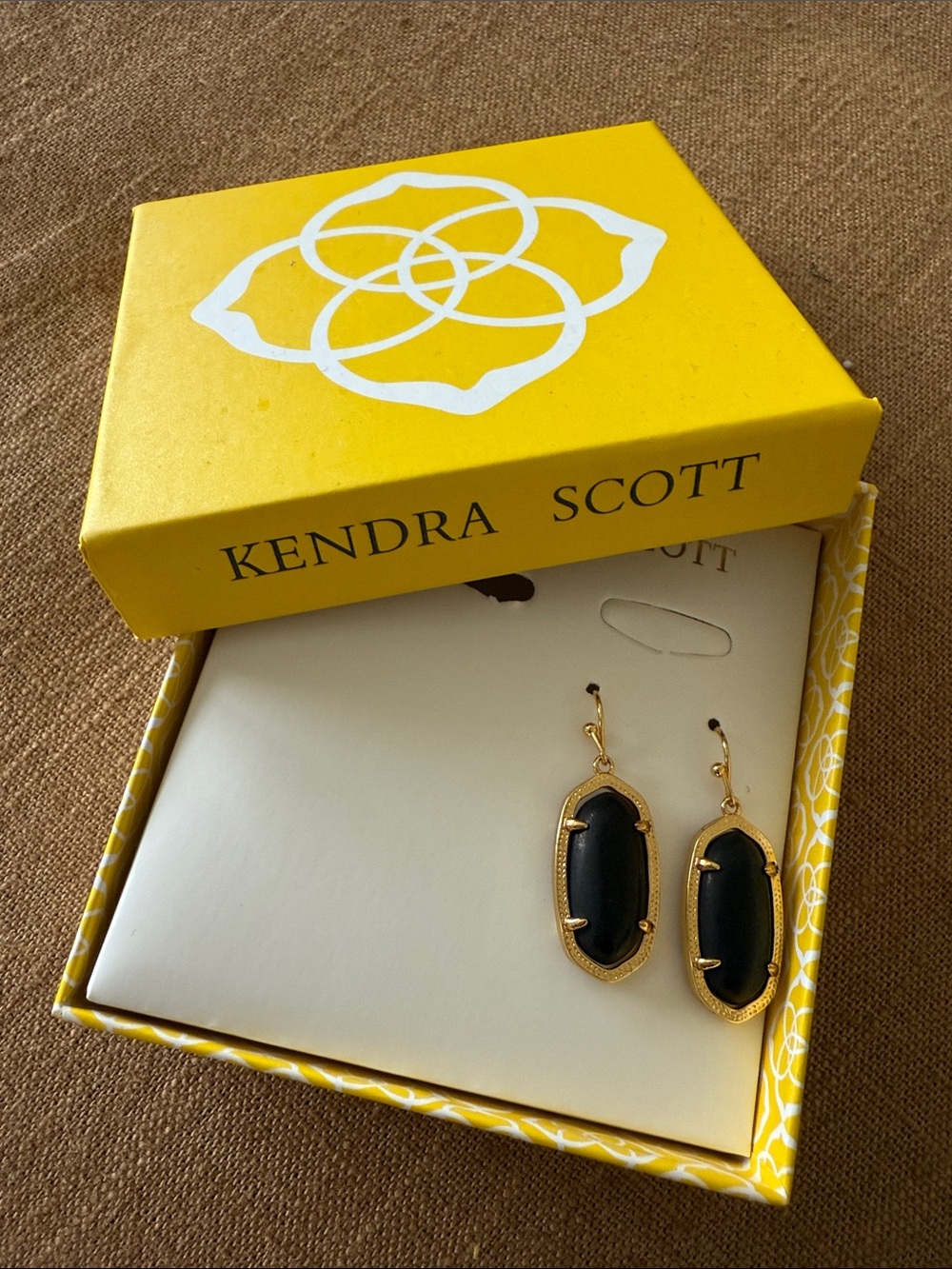 Kendra Scott Black and Gold Dangle Earrings